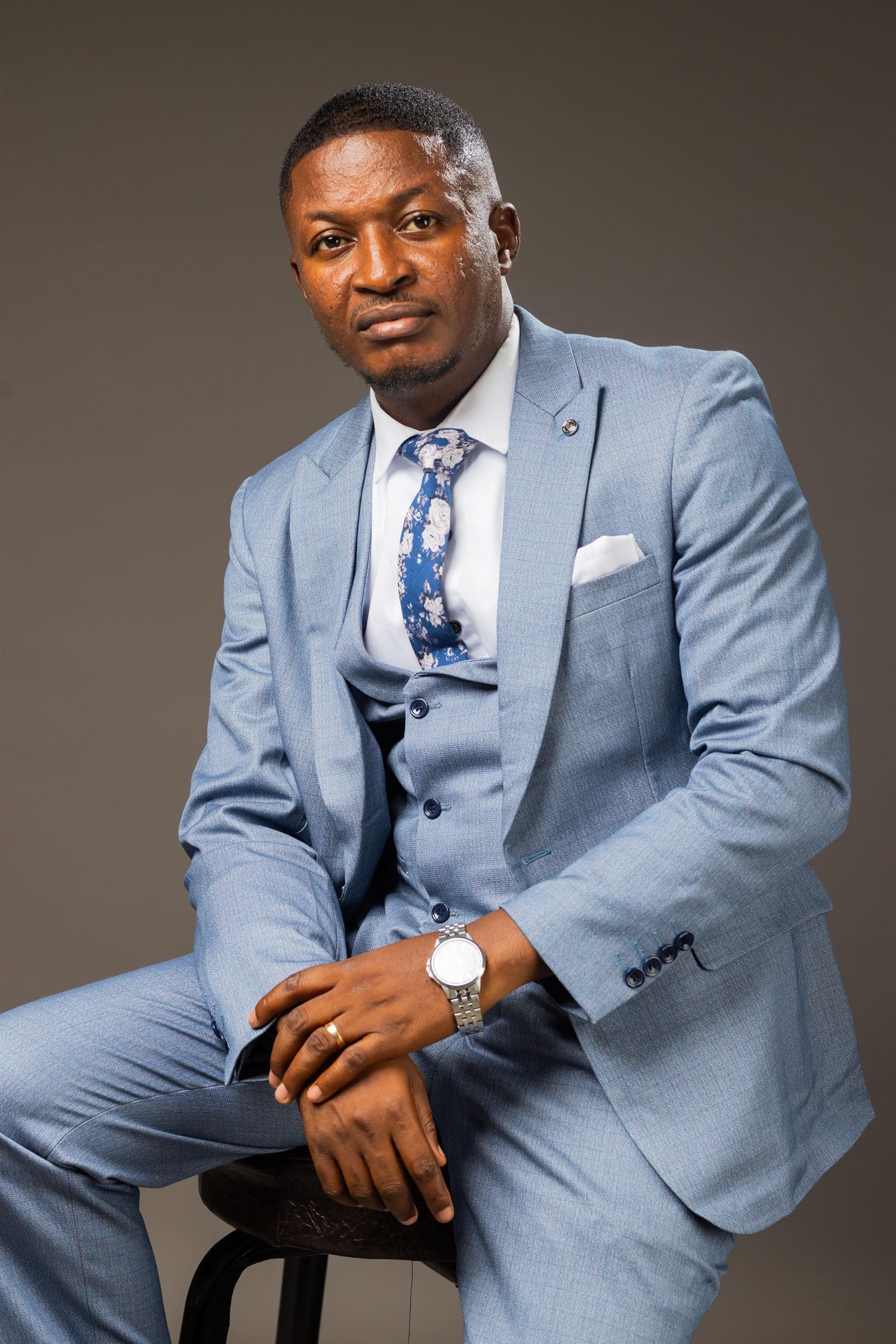 Minister Theophilus Badger in three-piece suit